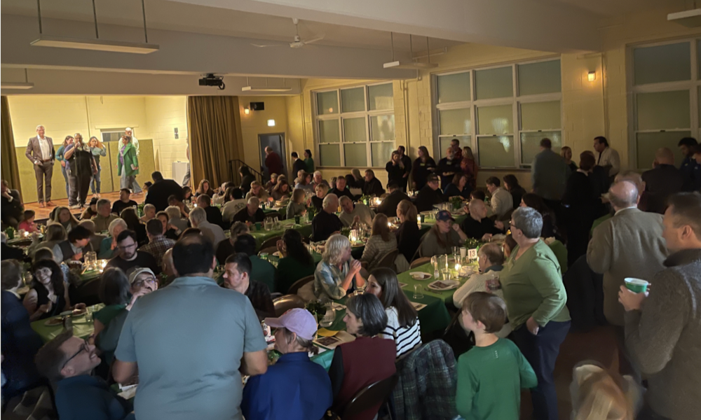 People eating at the corned beef and cabbage
dinner